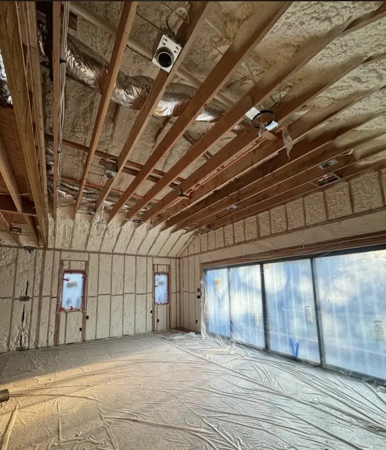 Interior walls and ceiling insulated with spray foam during new construction in Nebraska City